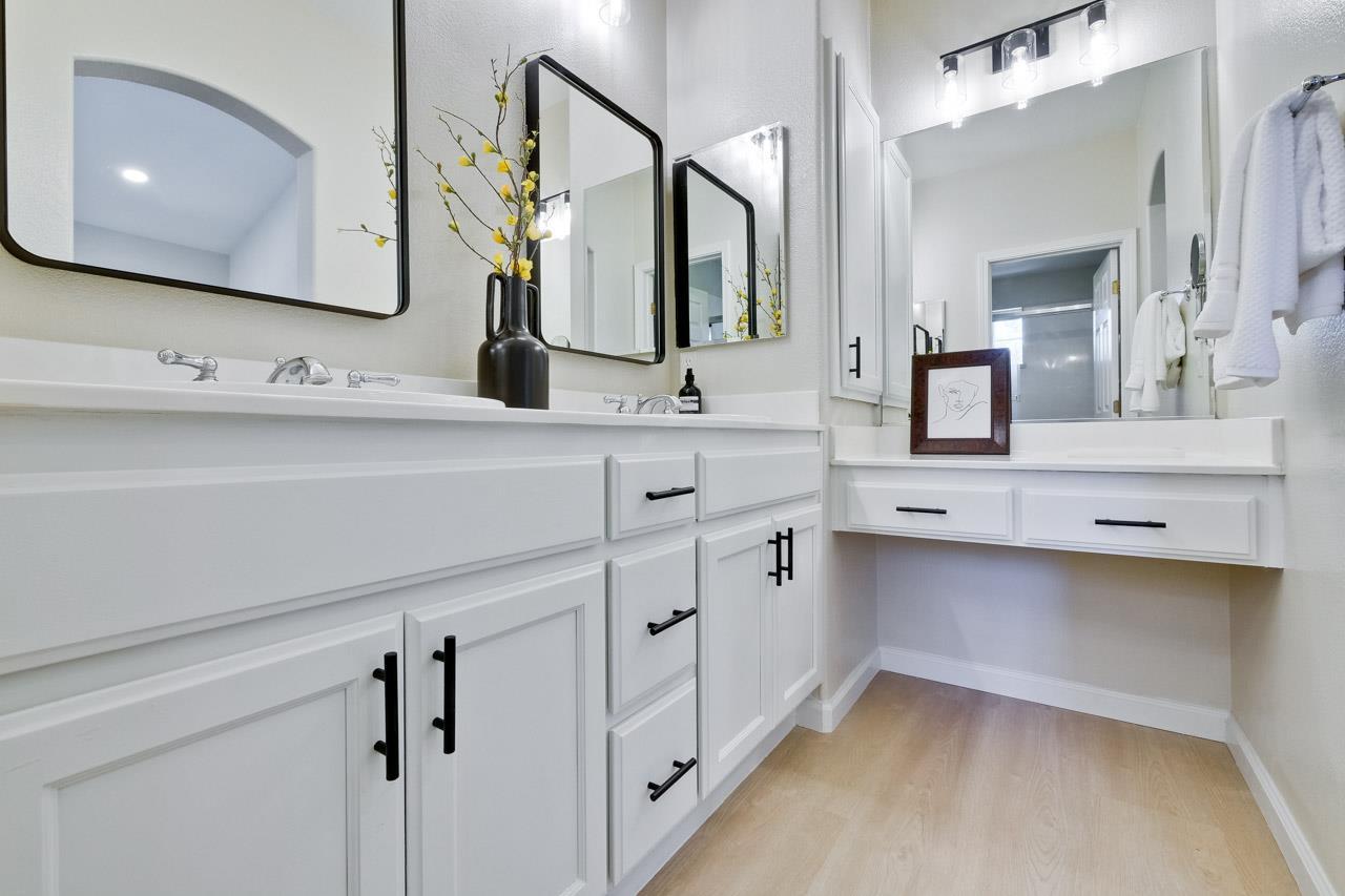 35489 Monterra Circle Union City, CA 94587 - Photo 27 of 52 a bathroom with a double vanity sink mirror and bathtub