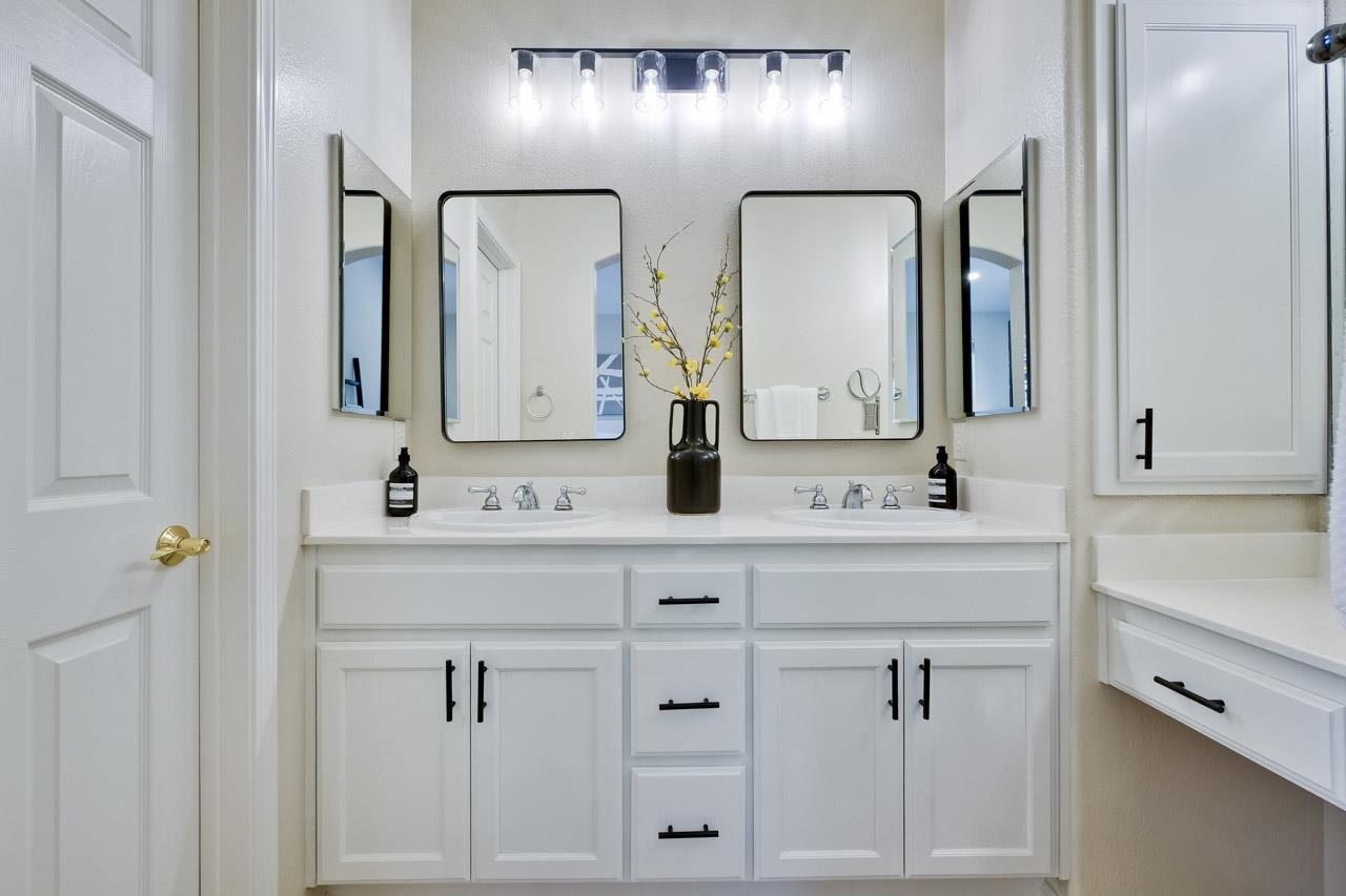 35489 Monterra Circle Union City, CA 94587 - Photo 28 of 52 a bathroom with double vanity sinks and a mirror