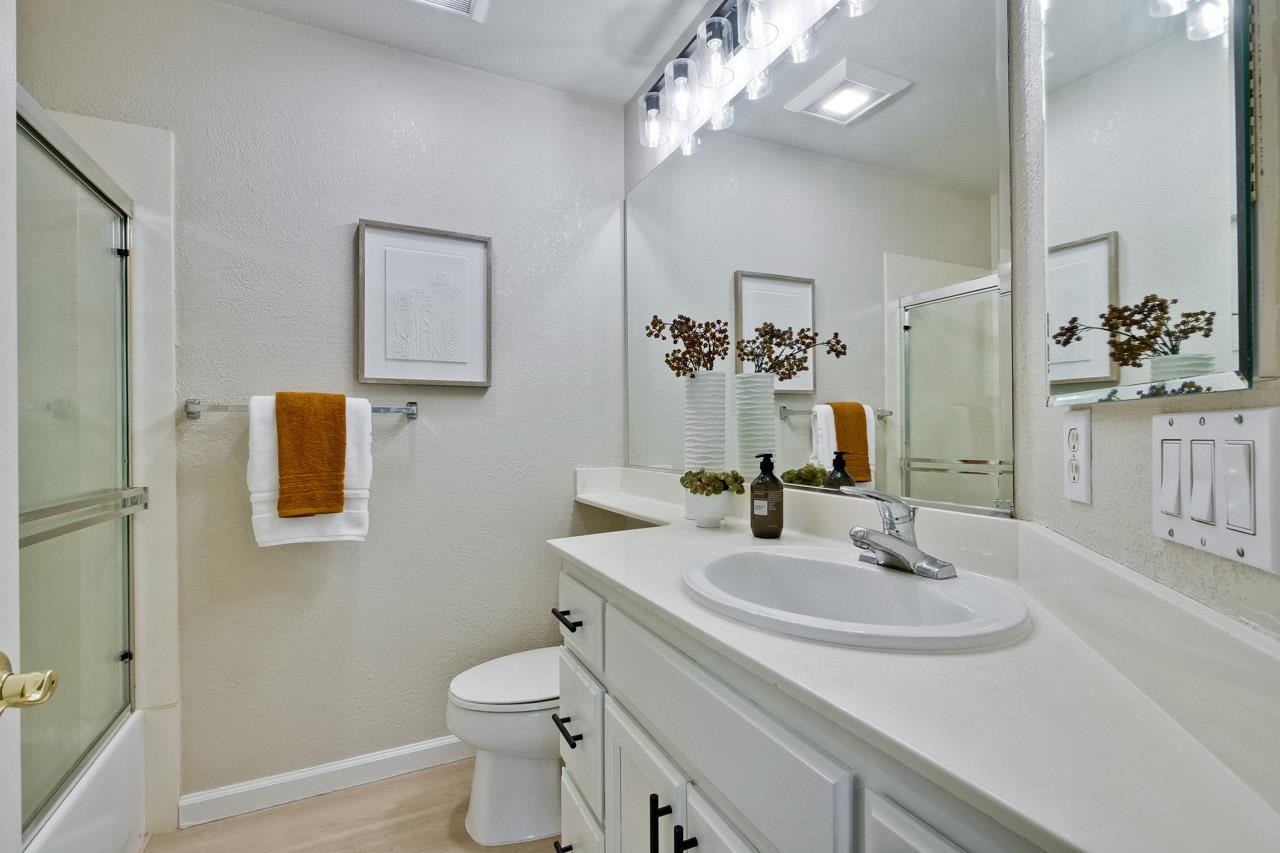 35489 Monterra Circle Union City, CA 94587 - Photo 38 of 52 a bathroom with a sink and a mirror with toilet