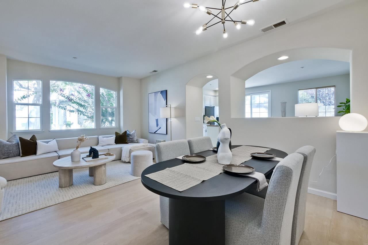 35489 Monterra Circle Union City, CA 94587 - Photo 9 of 52 a living room with furniture a large window and a chandelier