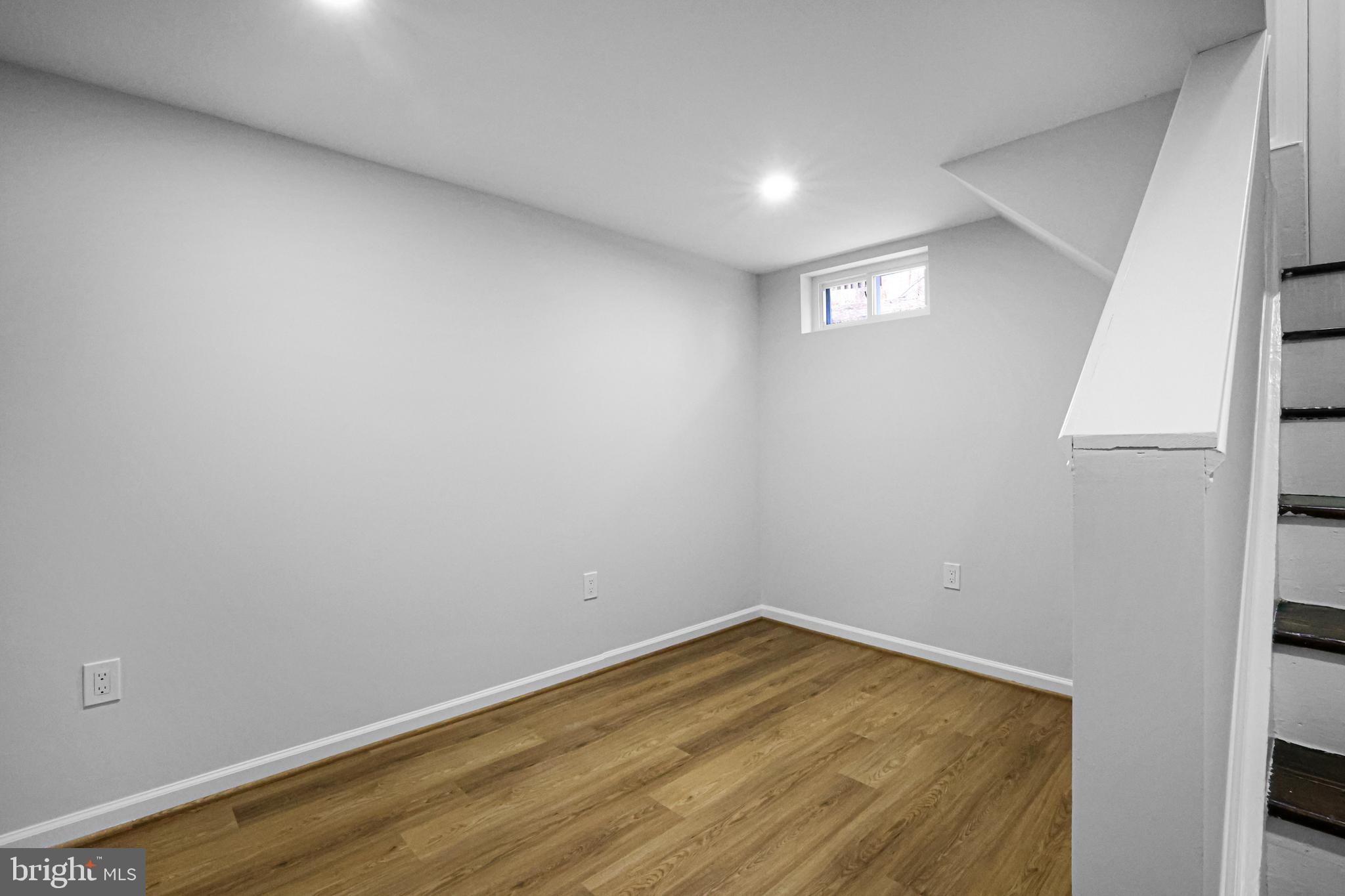 4305 Garrett Park Road Silver Spring, MD 20906 - Photo 28 of 39 a view of empty room with wooden floor