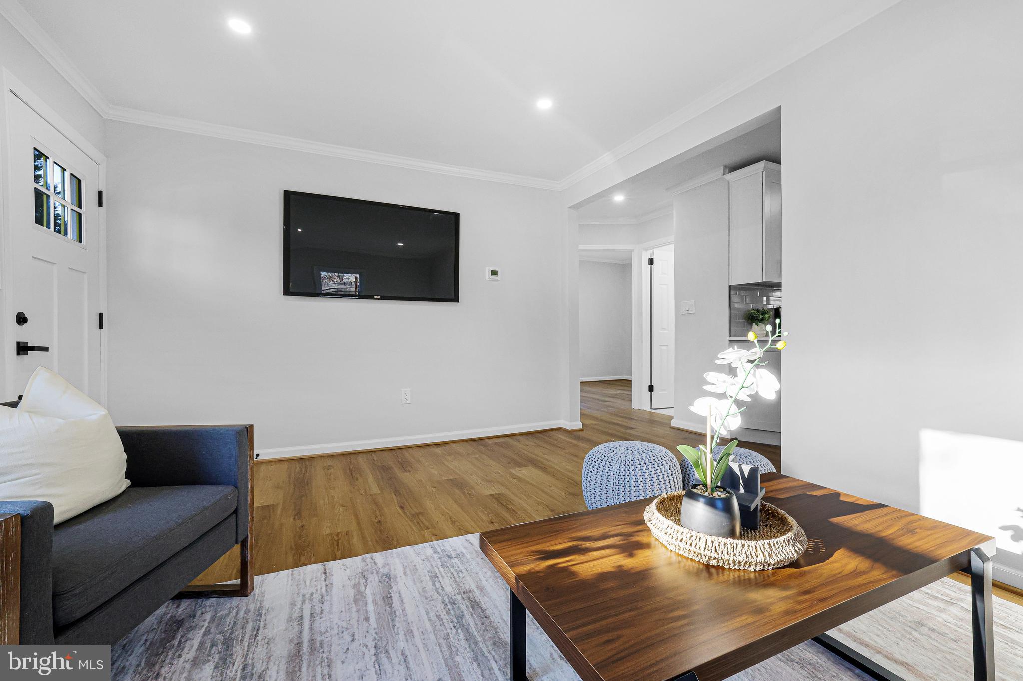 4305 Garrett Park Road Silver Spring, MD 20906 - Photo 8 of 39 a living room with furniture and a flat screen tv