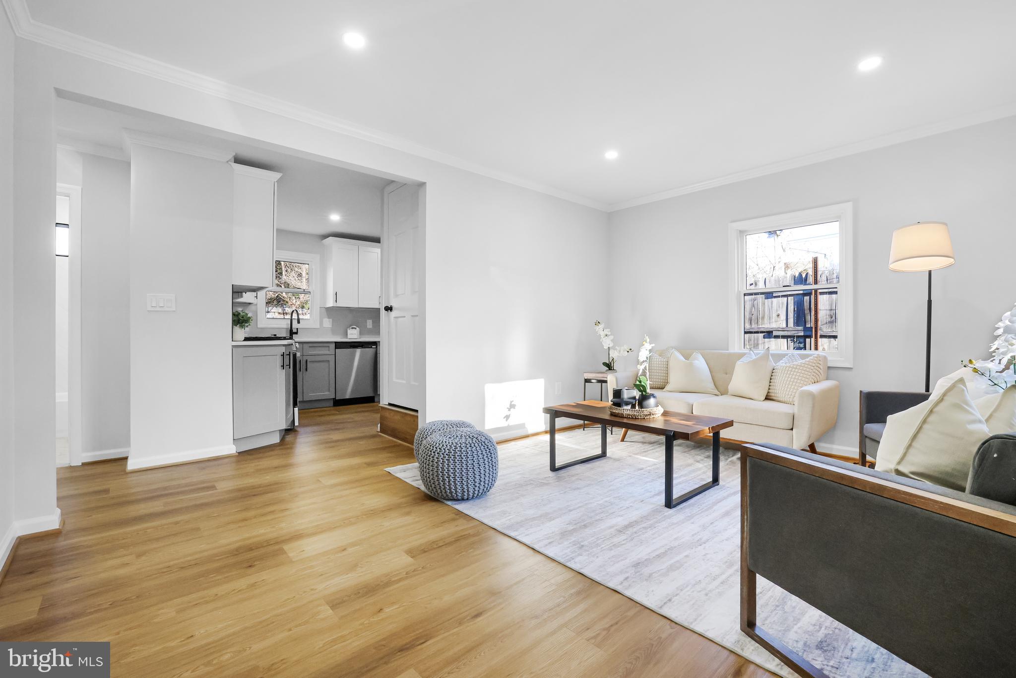 4305 Garrett Park Road Silver Spring, MD 20906 - Photo 10 of 39 a living room with furniture and a table