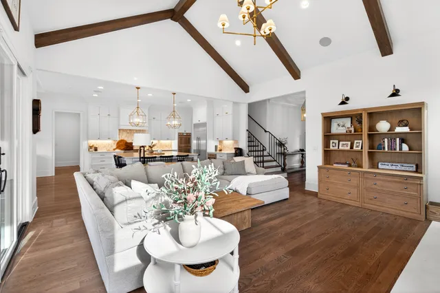 a kitchen with a stove and a white cabinets