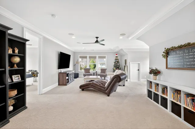 a bathroom with a granite countertop sink mirror vanity and toilet