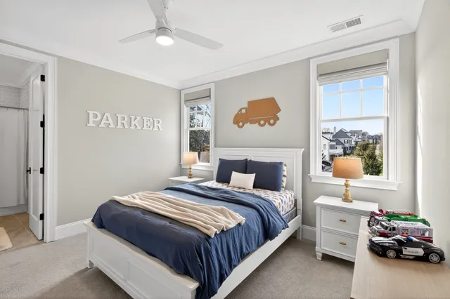 a front view of a house with a yard table and chairs