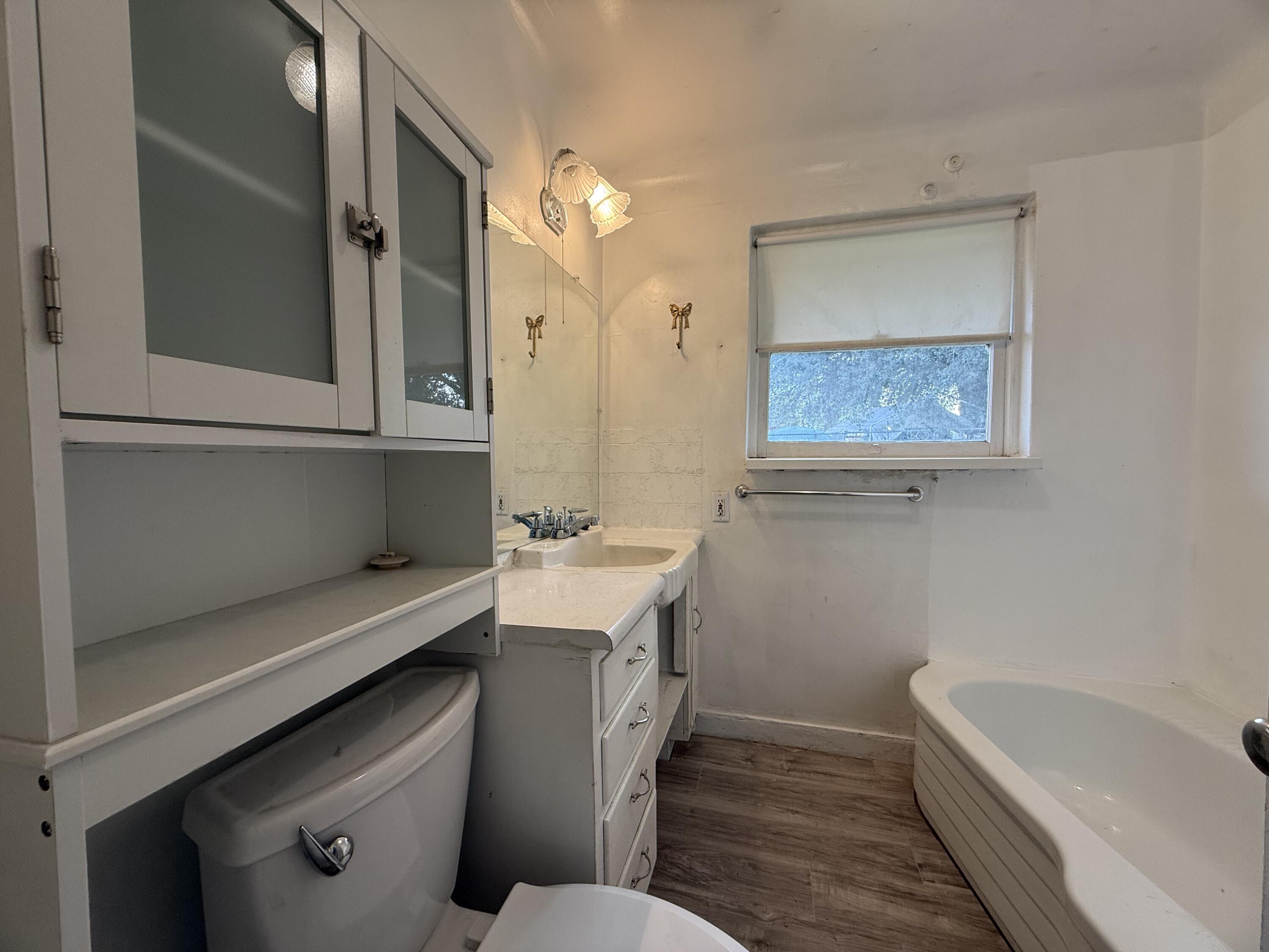 6820 Highway 273 Anderson, CA 96007 - Photo 11 of 35 a bathroom with a sink a toilet and bathtub