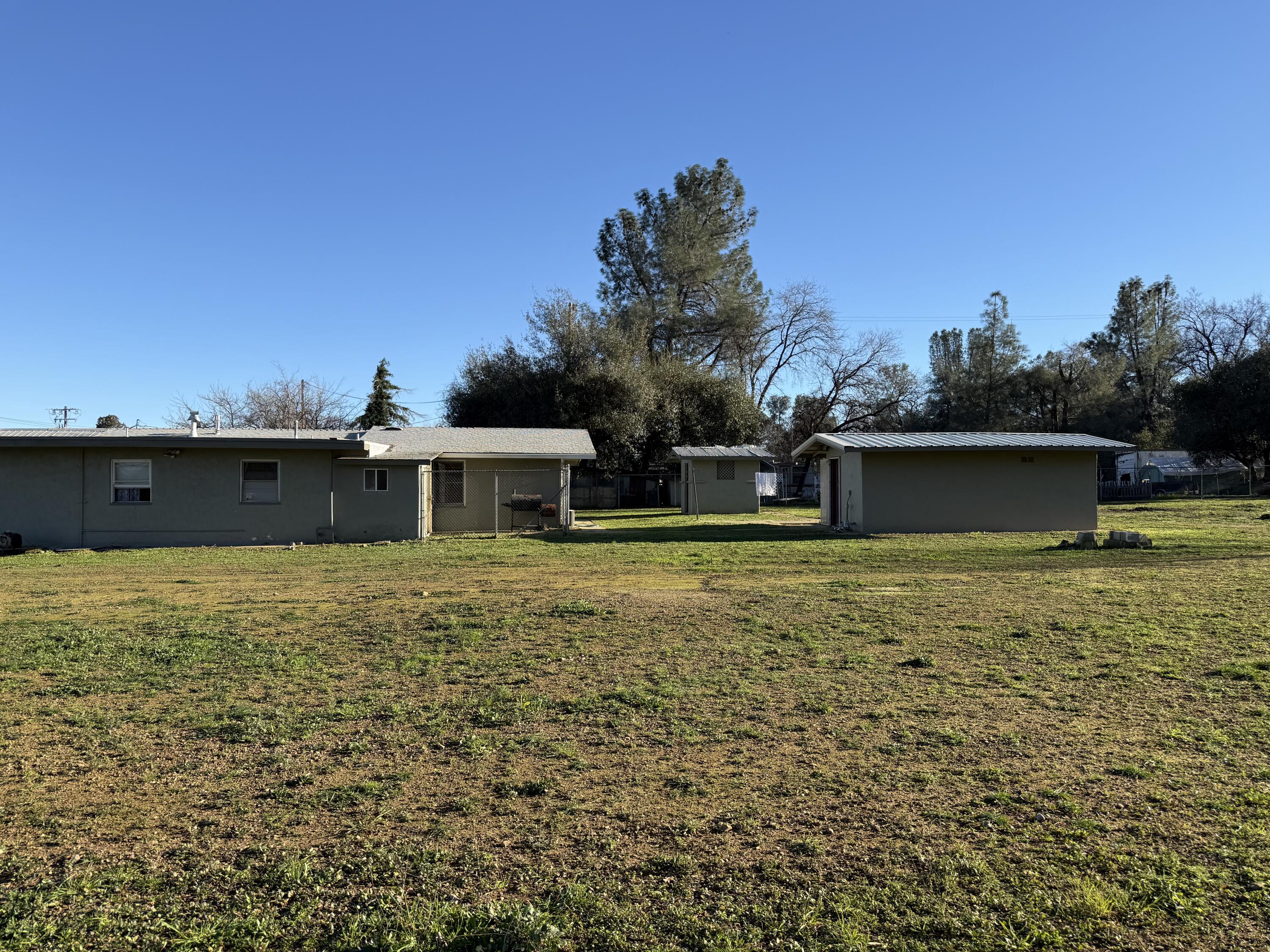 6820 Highway 273 Anderson, CA 96007 - Photo 21 of 35 a front view of a house with a yard