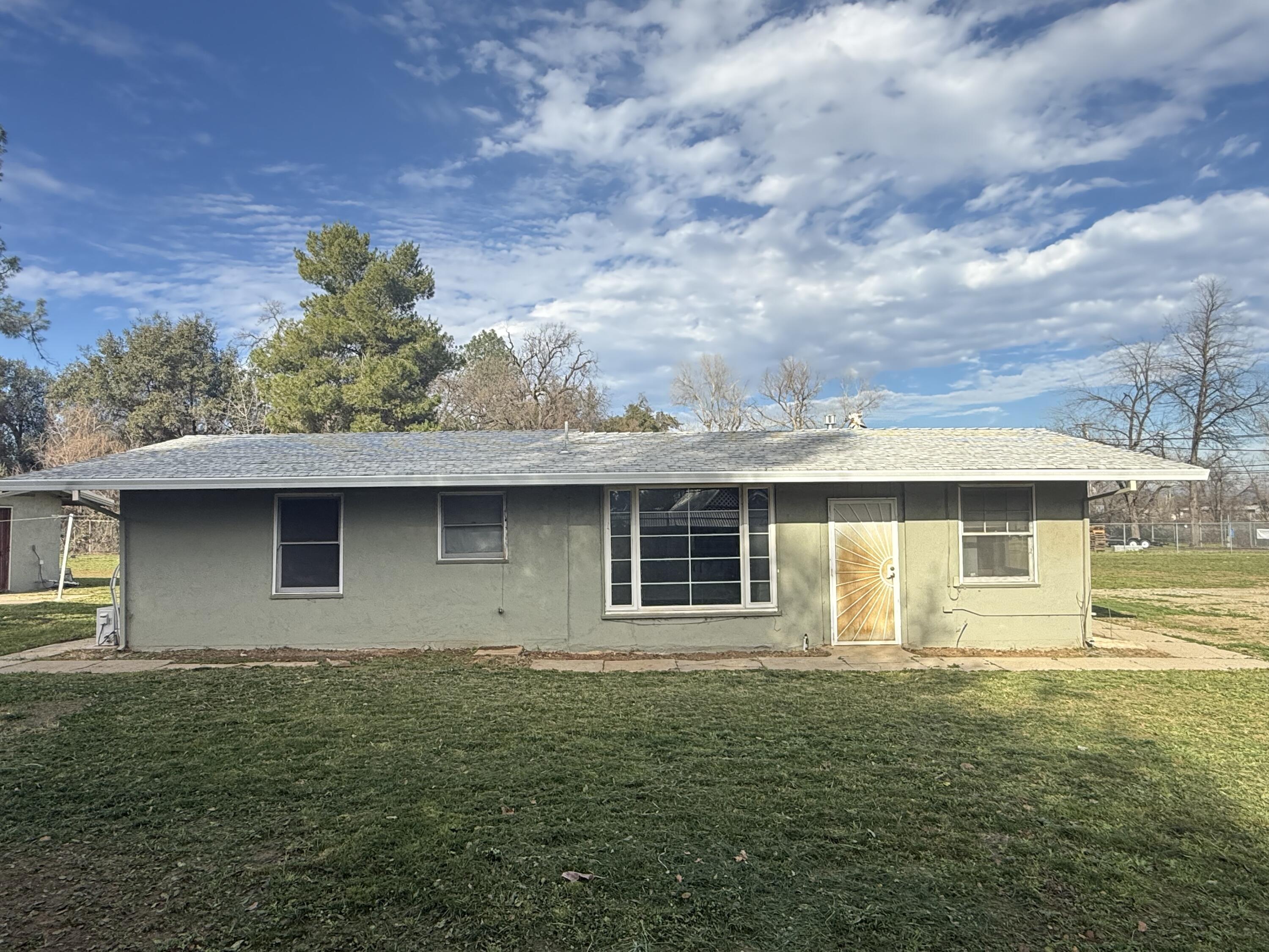 6820 Highway 273 Anderson, CA 96007 - Photo 27 of 35 a front view of a house with a garden