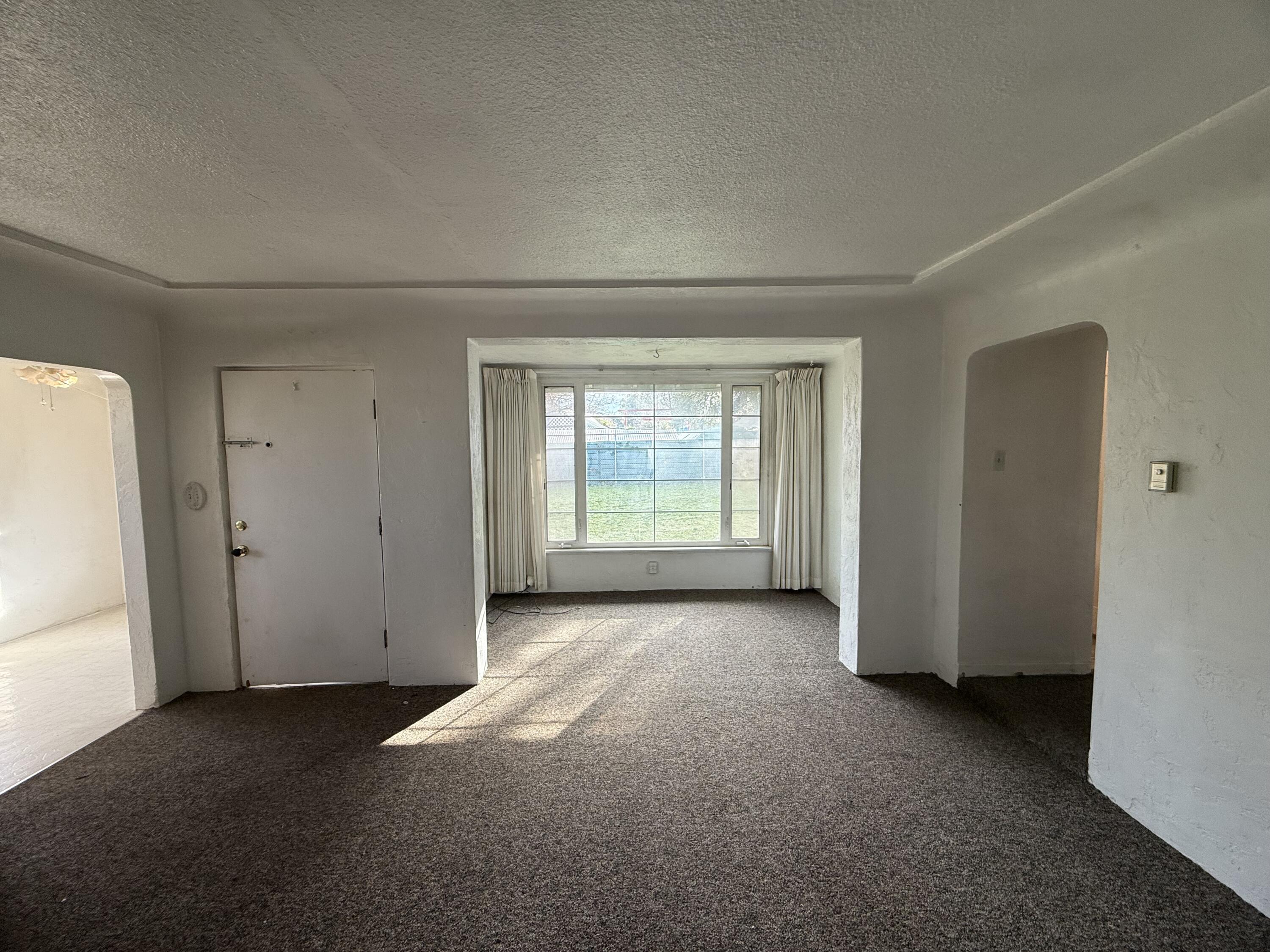 6820 Highway 273 Anderson, CA 96007 - Photo 6 of 35 an empty room with windows