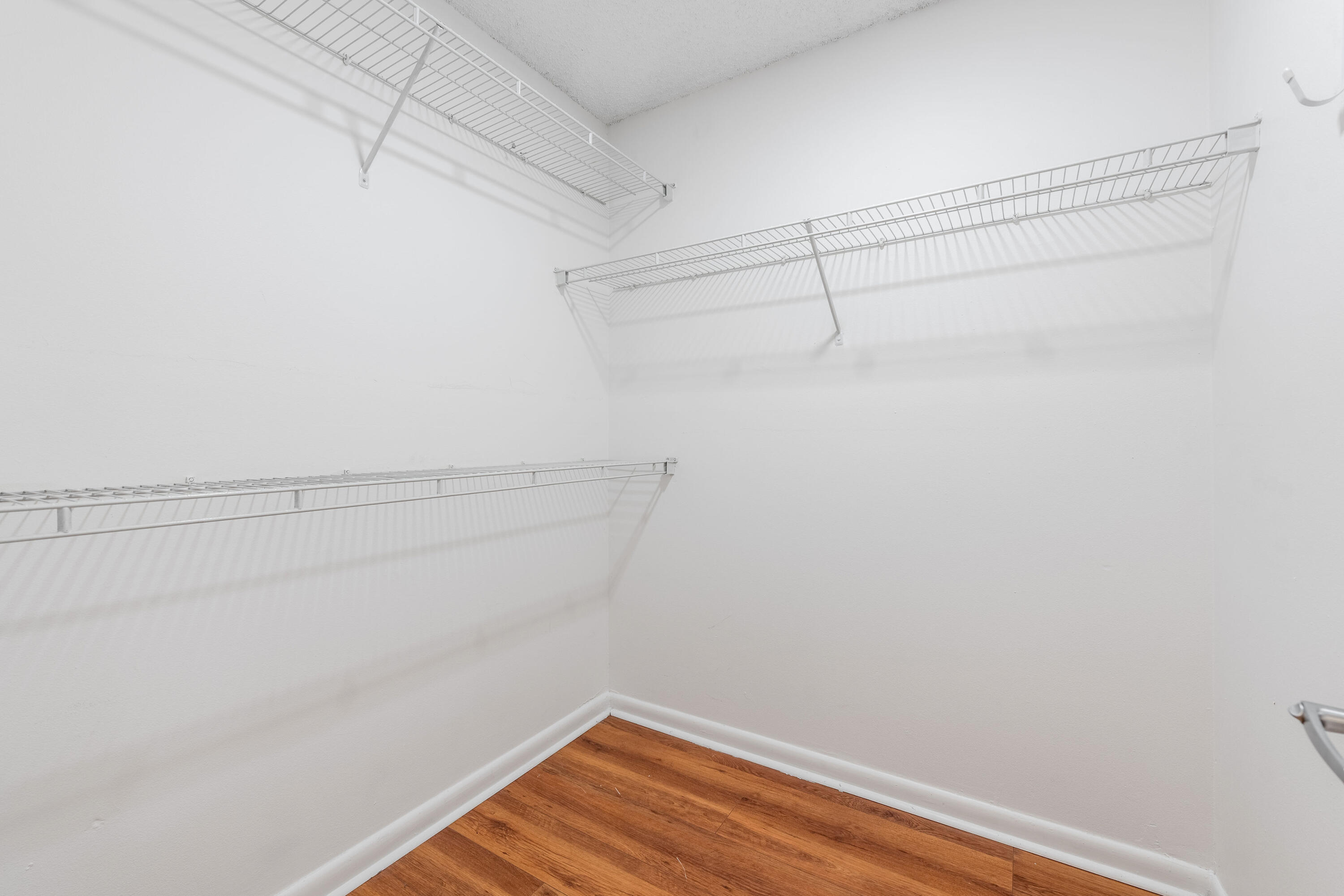 3153 Clint Moore Road, Unit 201 Boca Raton, FL 33496 - Photo 26 of 41 Primary bedroom room walking closet