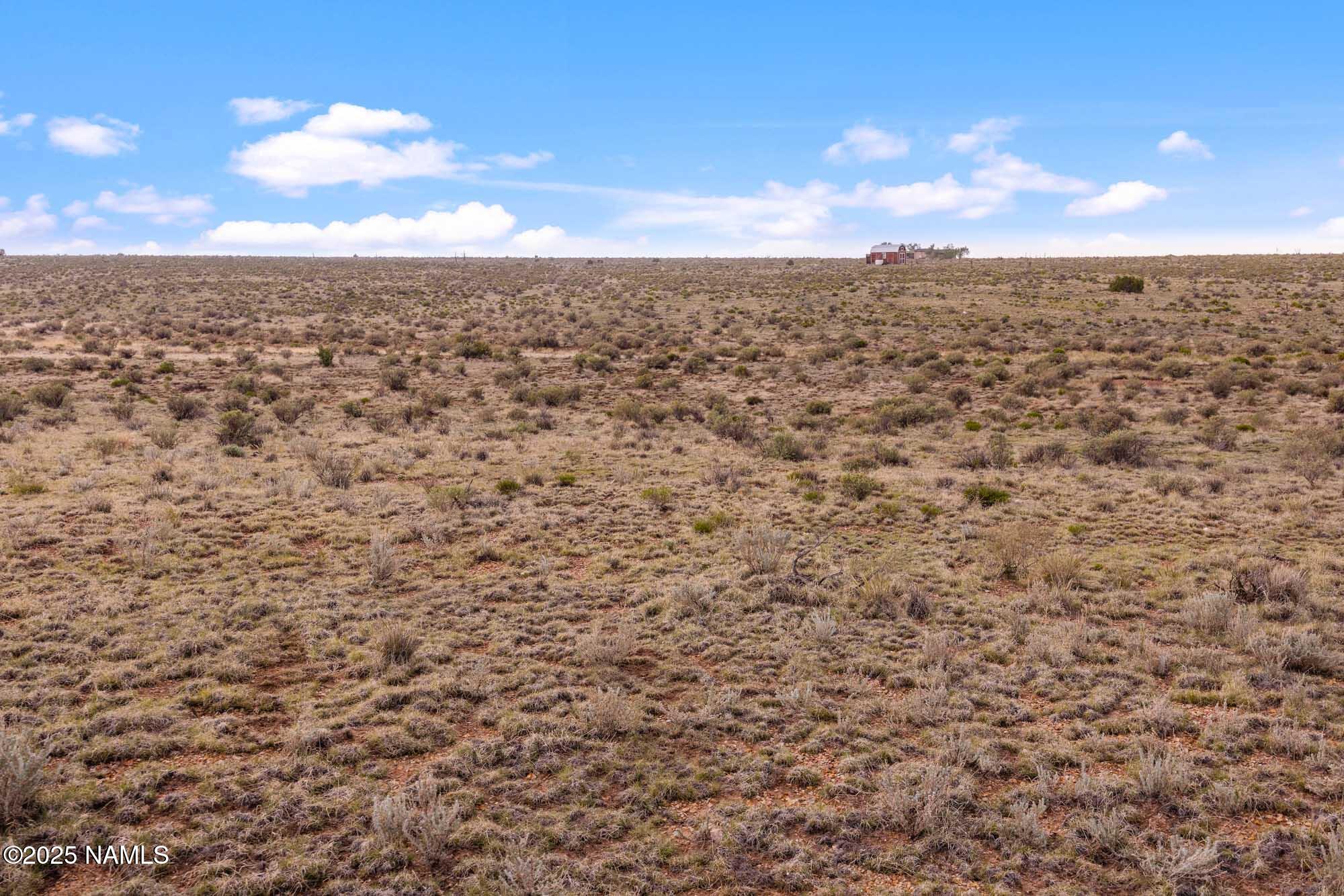 728 Pine Road Williams, AZ 86046 - Photo 20 of 26 an aerial view of residential building with yard