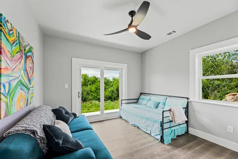 a living room with furniture and a window