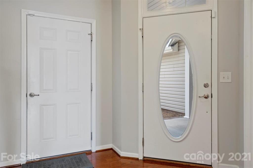 257 Garnet Court Fort Mill, SC 29708 - Photo 13 of 43 a view of a bedroom with wooden floor