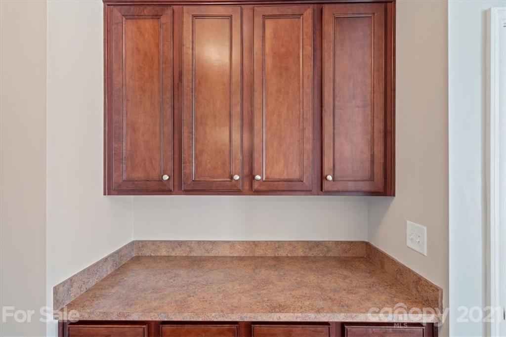 257 Garnet Court Fort Mill, SC 29708 - Photo 14 of 43 a view of a utility room with wooden floor