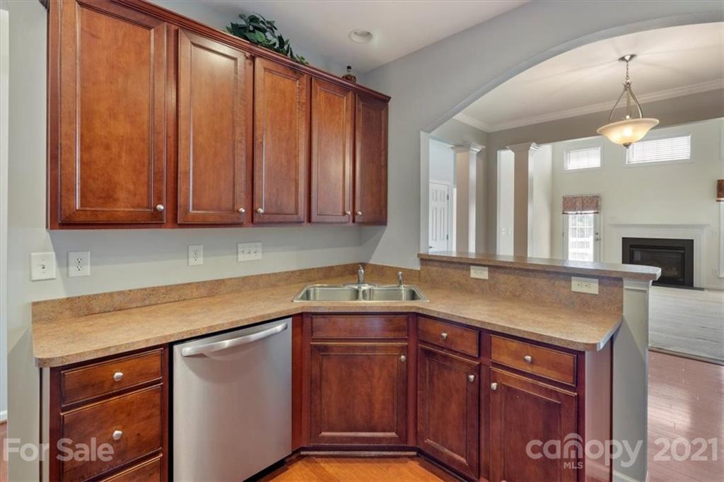 257 Garnet Court Fort Mill, SC 29708 - Photo 15 of 43 a kitchen with a sink cabinets and window