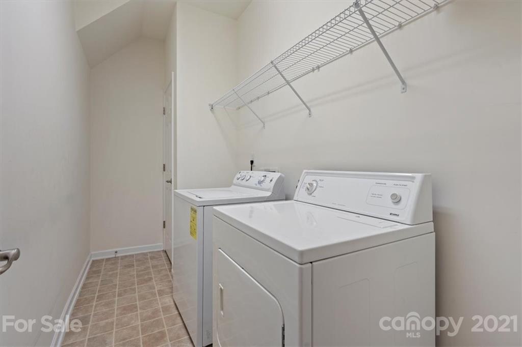 257 Garnet Court Fort Mill, SC 29708 - Photo 29 of 43 a utility room with dryer and washer