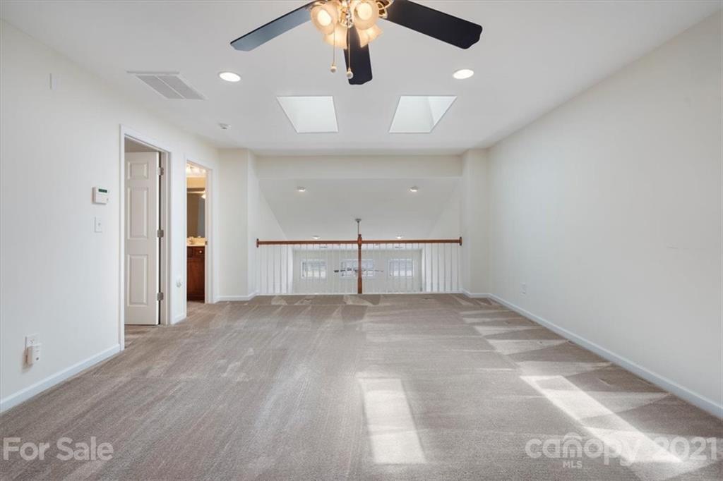 257 Garnet Court Fort Mill, SC 29708 - Photo 35 of 43 a view of empty room with ceiling fan