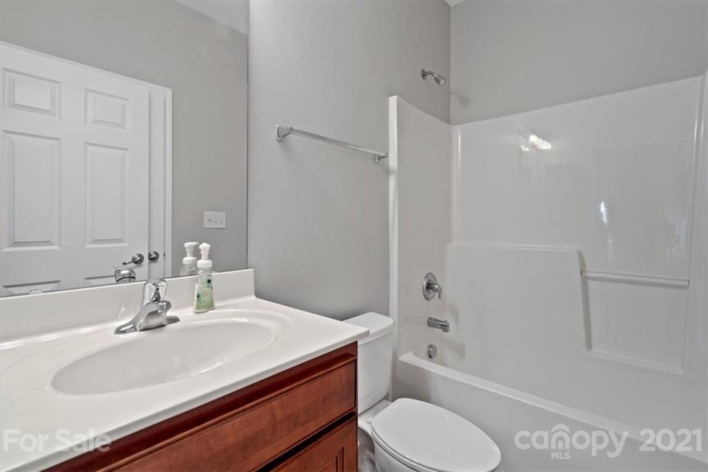 257 Garnet Court Fort Mill, SC 29708 - Photo 38 of 43 a bathroom with a sink toilet tub and shower