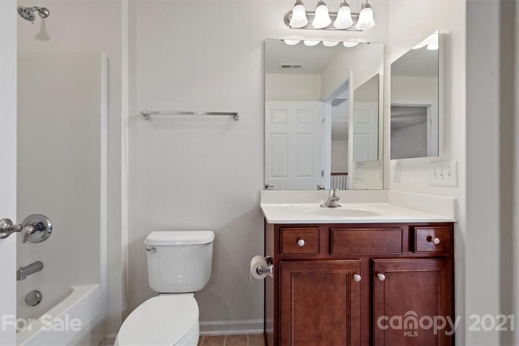 257 Garnet Court Fort Mill, SC 29708 - Photo 40 of 43 a bathroom with a sink a toilet and shower