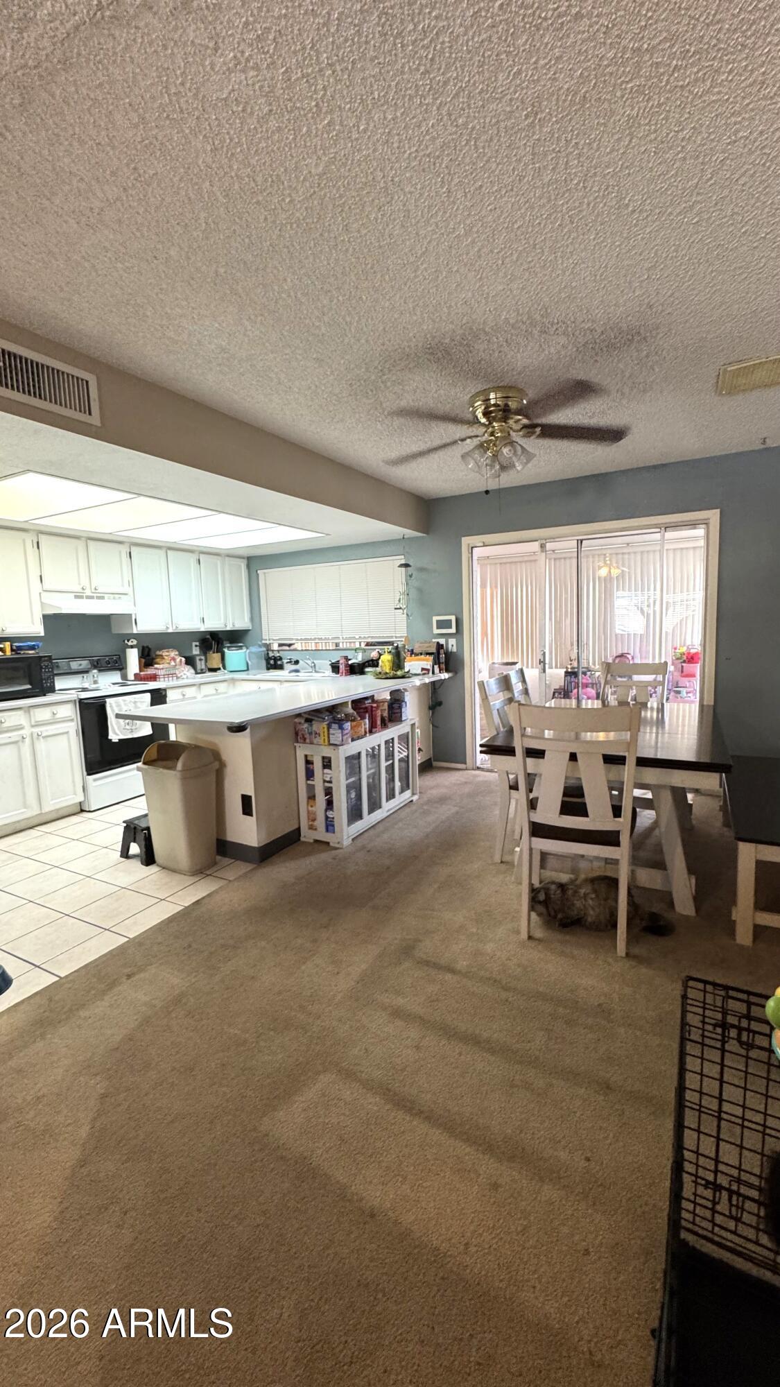 4151 West Shaw Butte Drive Phoenix, AZ 85029 - Photo 4 of 17 a kitchen with lots of counter top space