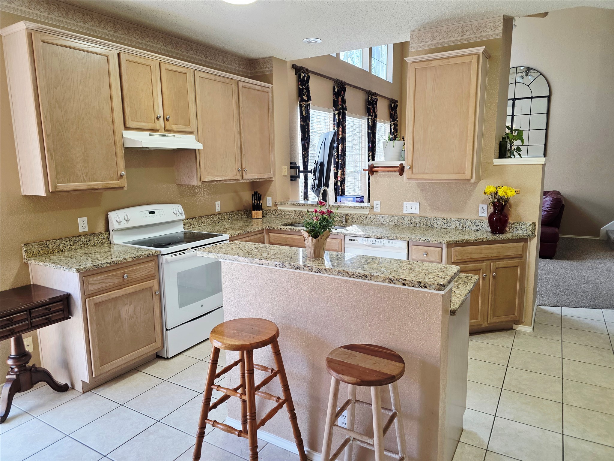 16303 Ascent Cove Pflugerville, TX 78660 - Photo 3 of 26 Kitchen from dining area