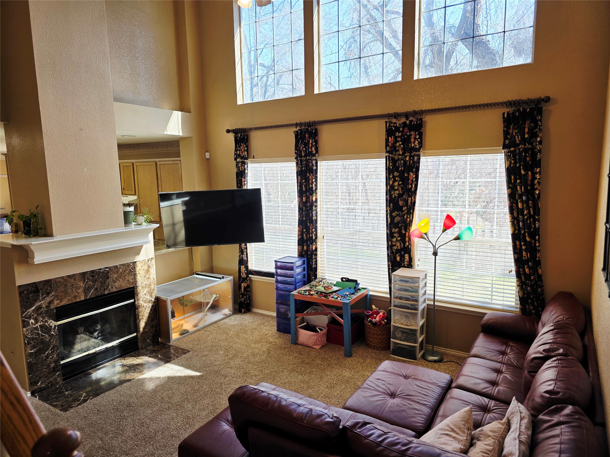 16303 Ascent Cove Pflugerville, TX 78660 - Photo 7 of 26 Living room backs up to the kitchen area with a fireplace