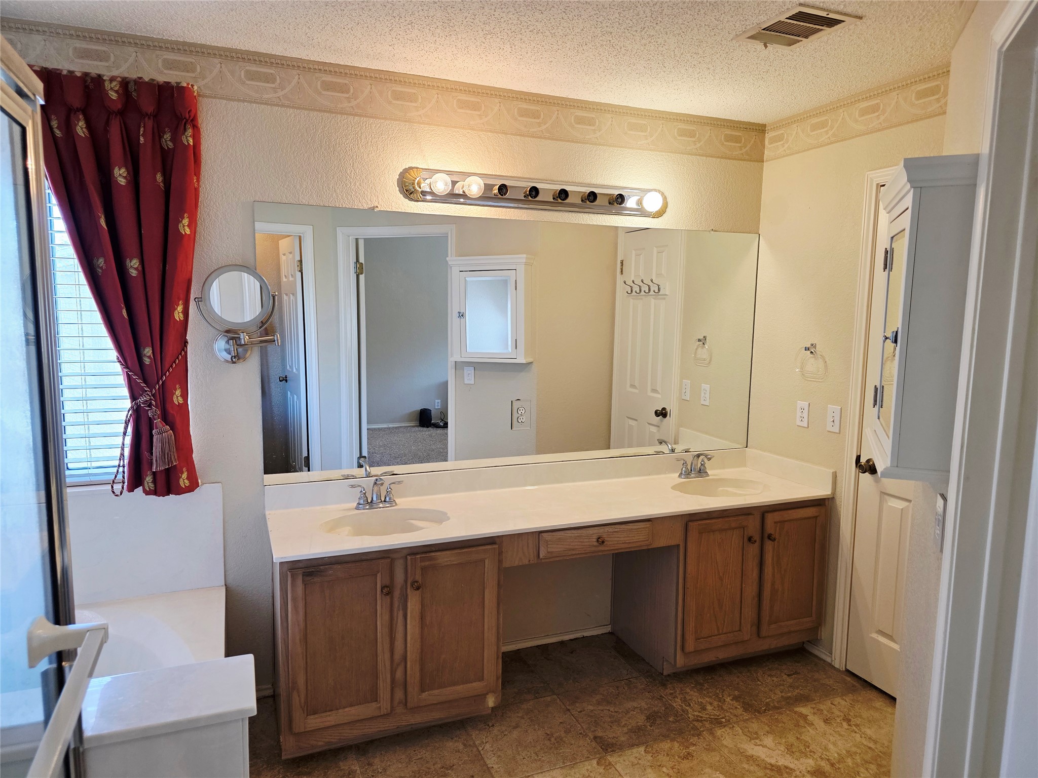 16303 Ascent Cove Pflugerville, TX 78660 - Photo 10 of 26 Primary Bathroom with dual vanity