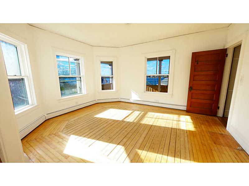 1565 Main Road Tiverton, RI 02878 - Photo 13 of 25 Living Room. Views of the Water from the Living Room.