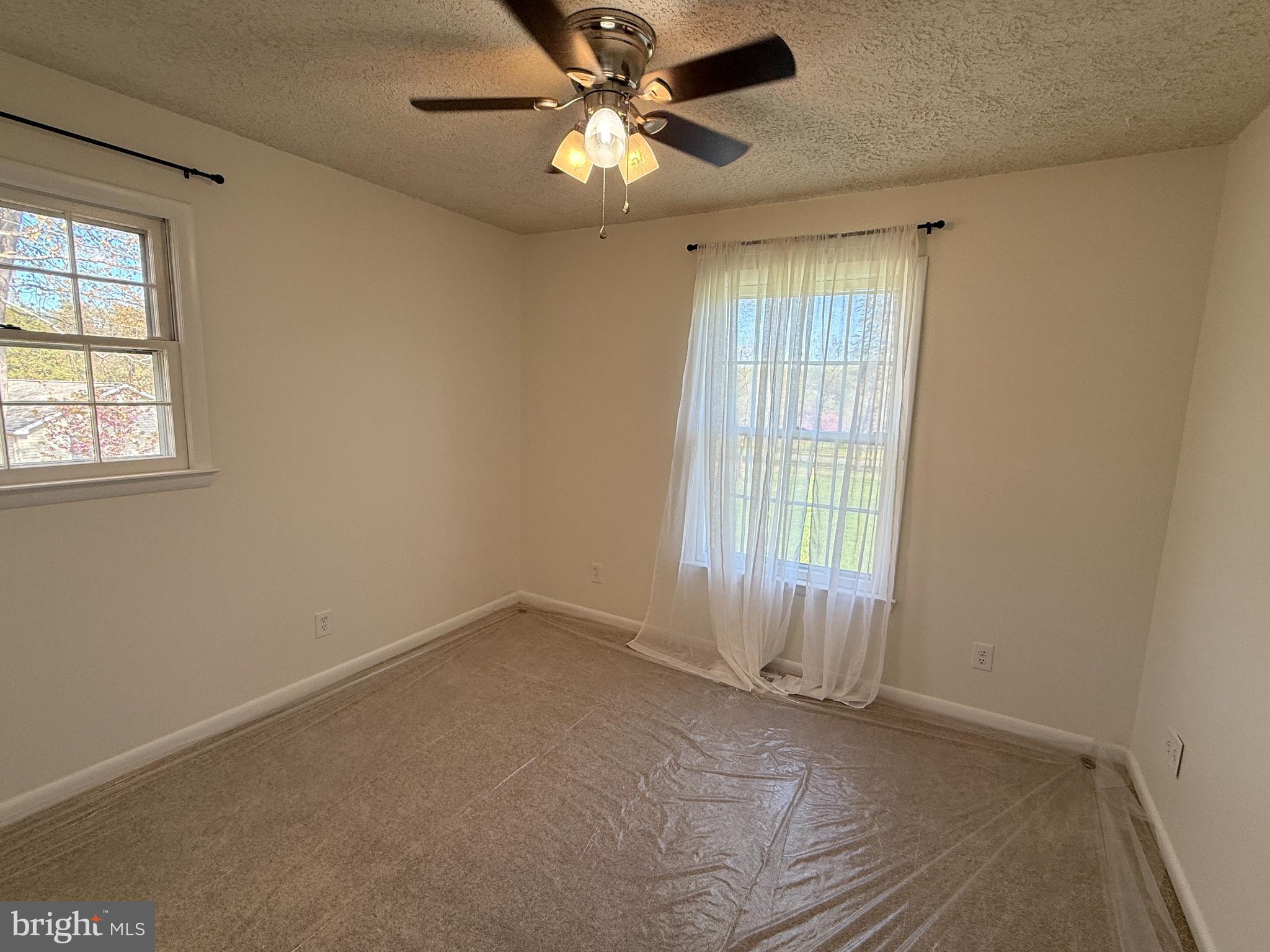 5572 Old Bust Head Road Broad Run, VA 20137 - Photo 24 of 30 a view of an empty room with a window