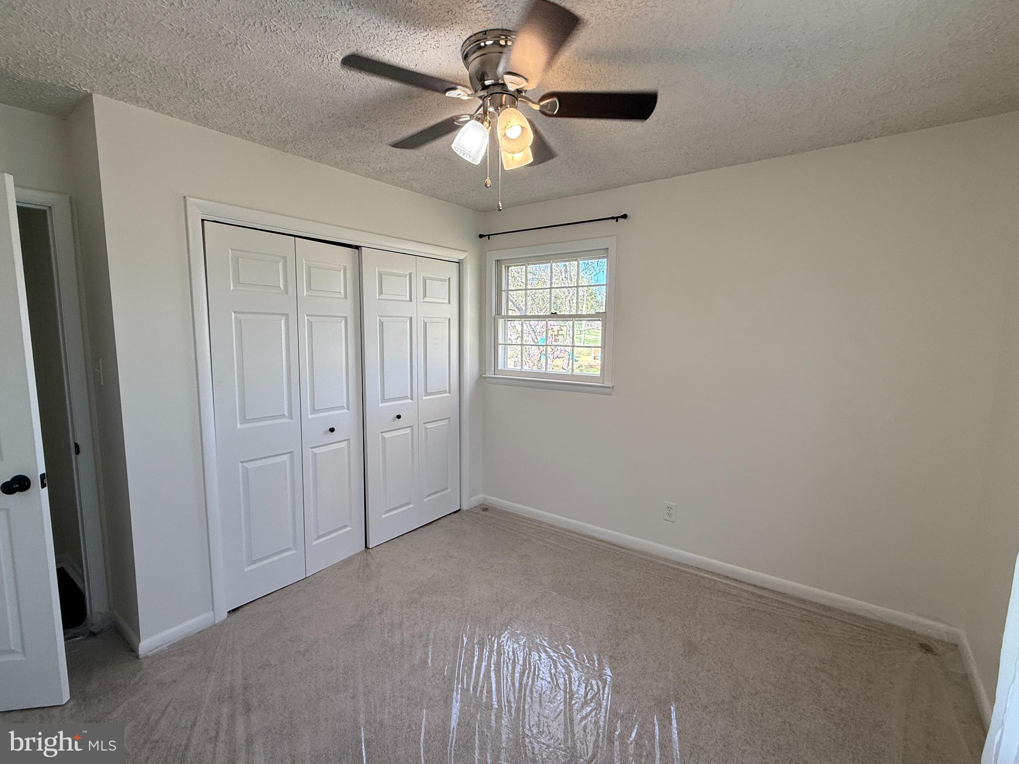 5572 Old Bust Head Road Broad Run, VA 20137 - Photo 25 of 30 a view of an empty room with a window