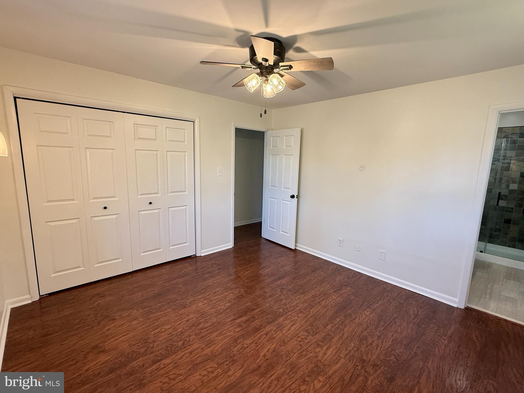 5572 Old Bust Head Road Broad Run, VA 20137 - Photo 27 of 30 a view of an empty room with wooden floor