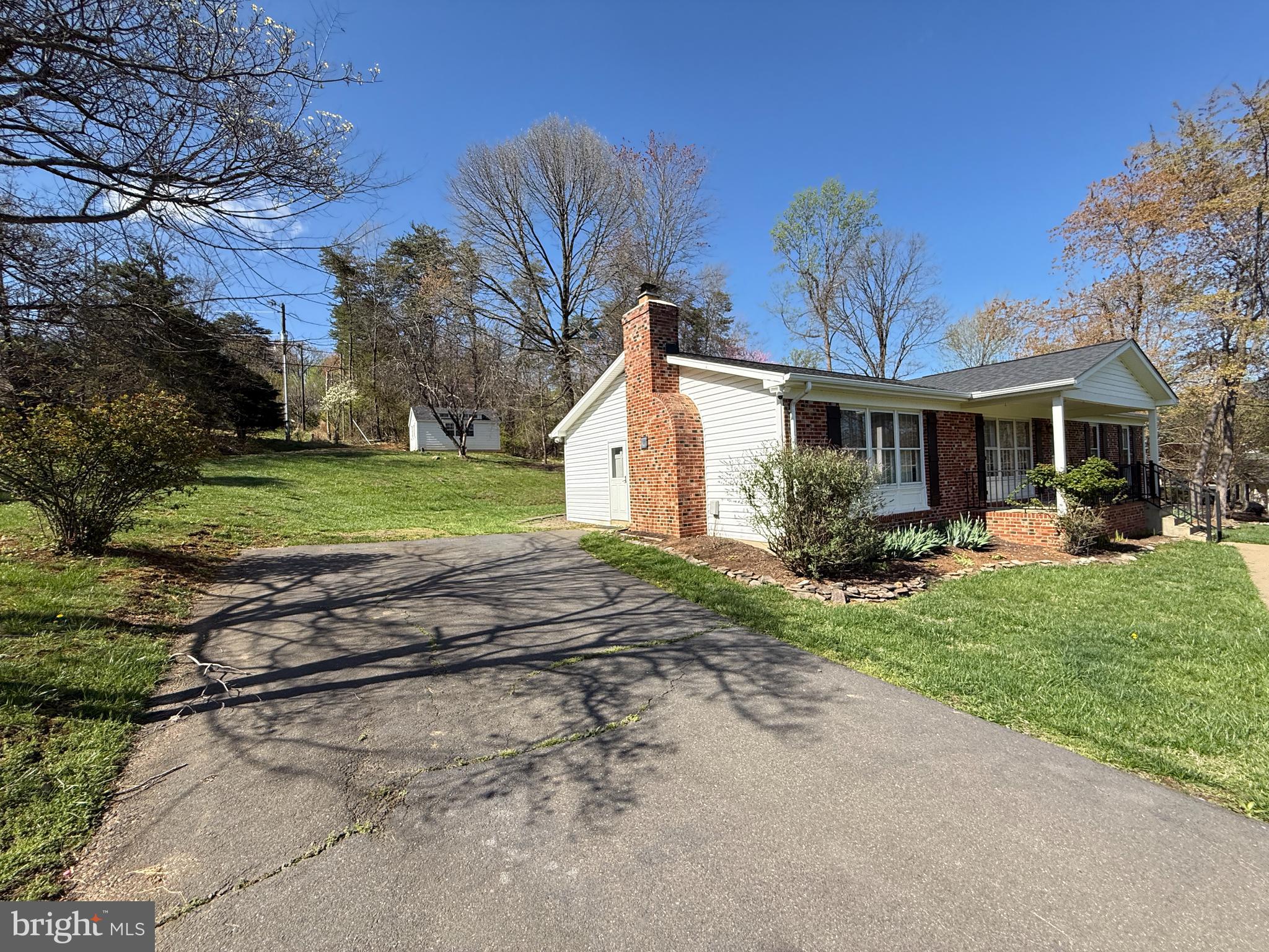 5572 Old Bust Head Road Broad Run, VA 20137 - Photo 5 of 30 a view of a house with a yard and plants