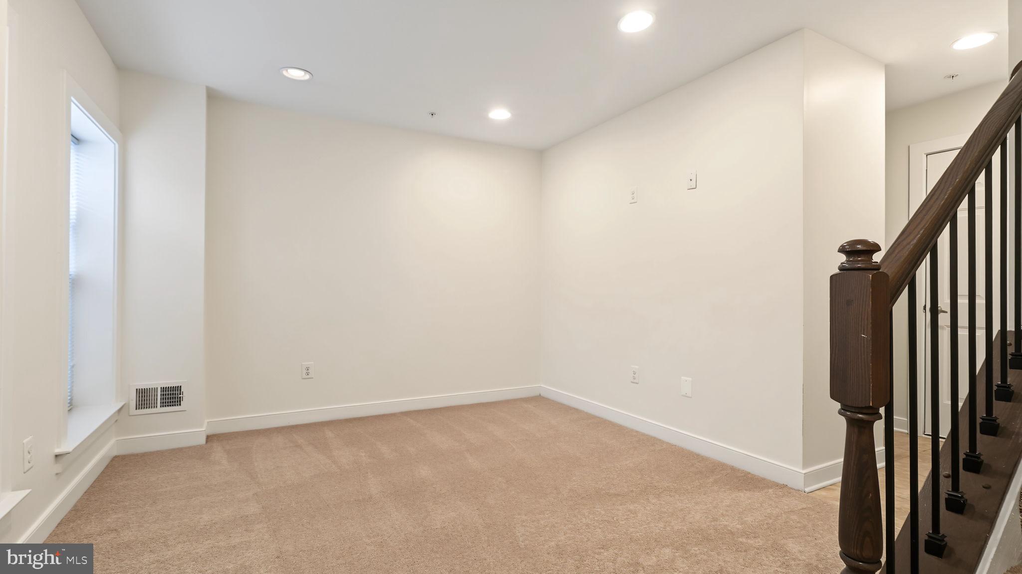 9824 Fields Road Gaithersburg, MD 20878 - Photo 35 of 40 BASEMENT RECREATION SPACE