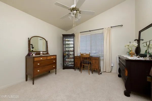 a room with furniture and a flat screen tv
