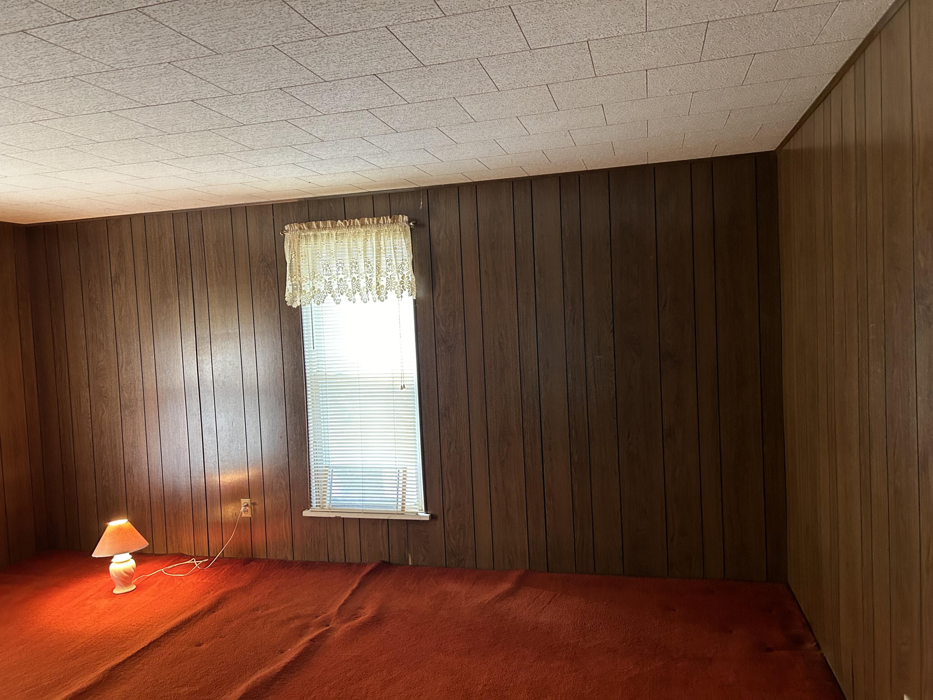 617 North Abigail Street Rensselaer, IN 47978 - Photo 19 of 44 wooden floor in an empty room with a window