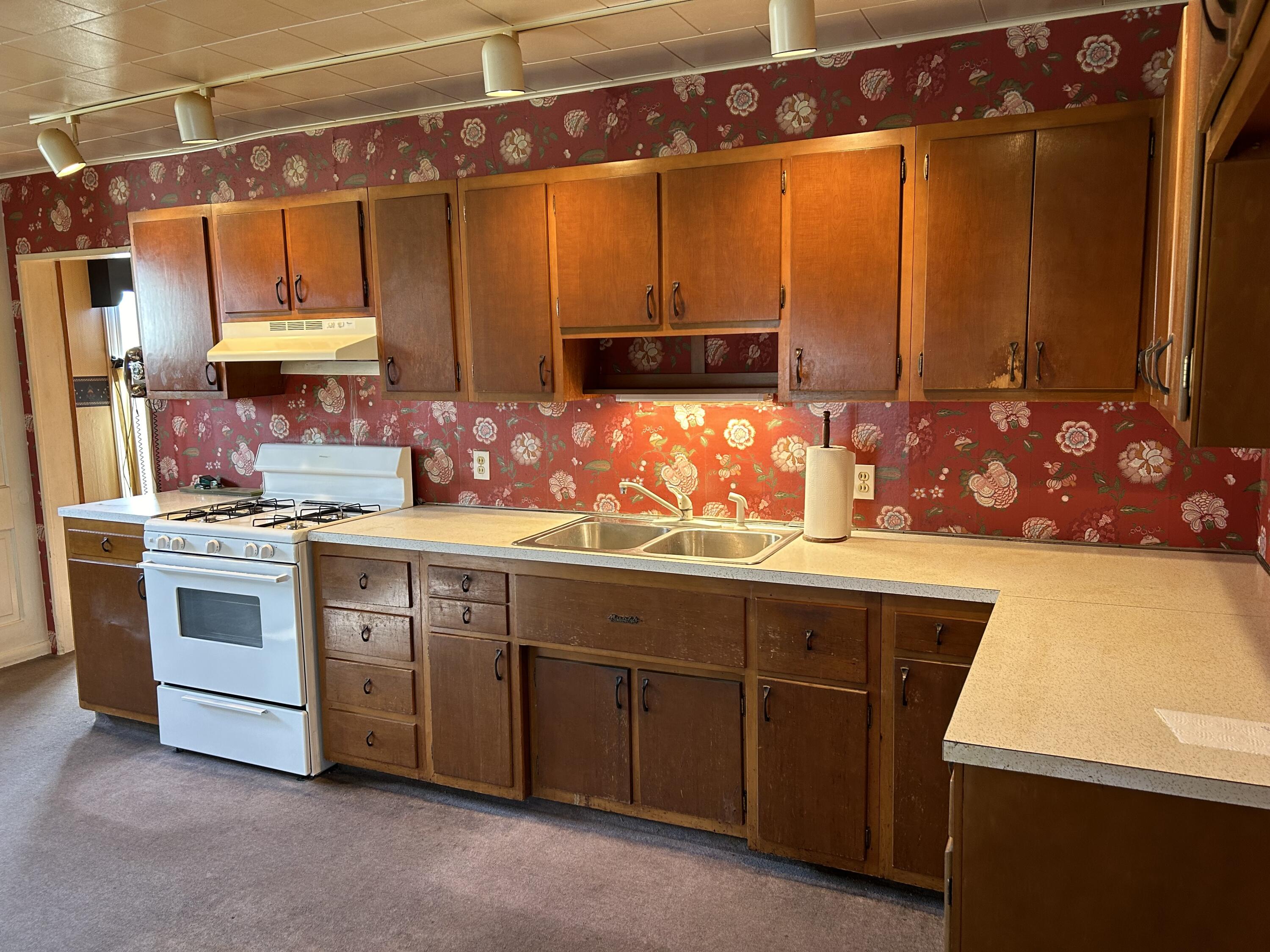 617 North Abigail Street Rensselaer, IN 47978 - Photo 8 of 44 a kitchen with a sink cabinets and window