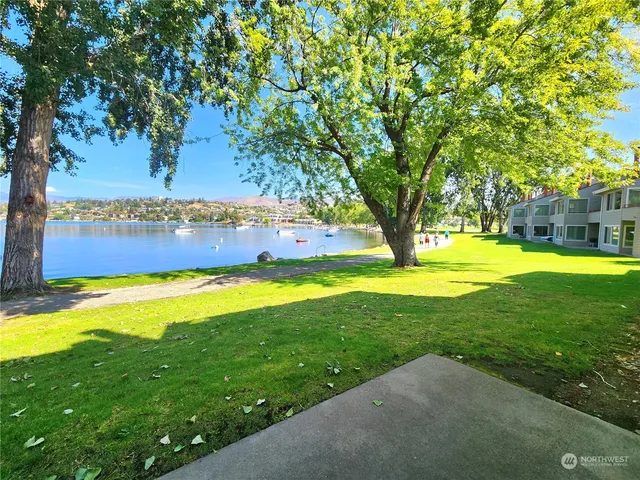 a view of swimming pool with an outdoor space and seating area