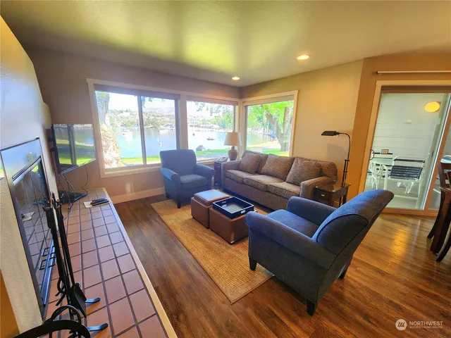a living room with furniture and a rug