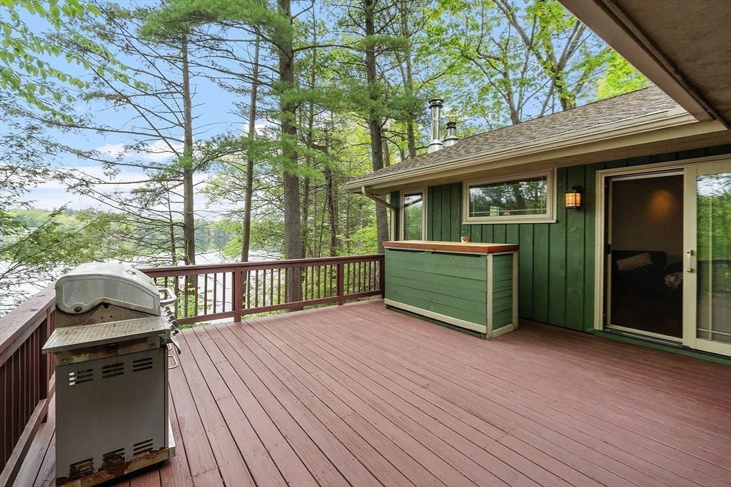 260 Fort Pond Road Lancaster, MA 01523 - Photo 36 of 41 a view of a deck with wooden floor and fence