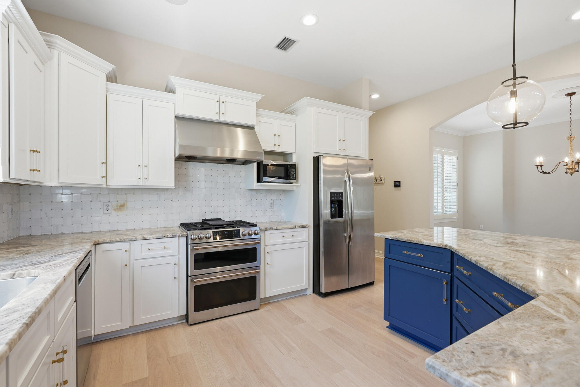 413 Sea Winds Drive Santa Rosa Beach, FL 32459 - Photo 20 of 65 a kitchen with stainless steel appliances granite countertop a stove a sink and a refrigerator