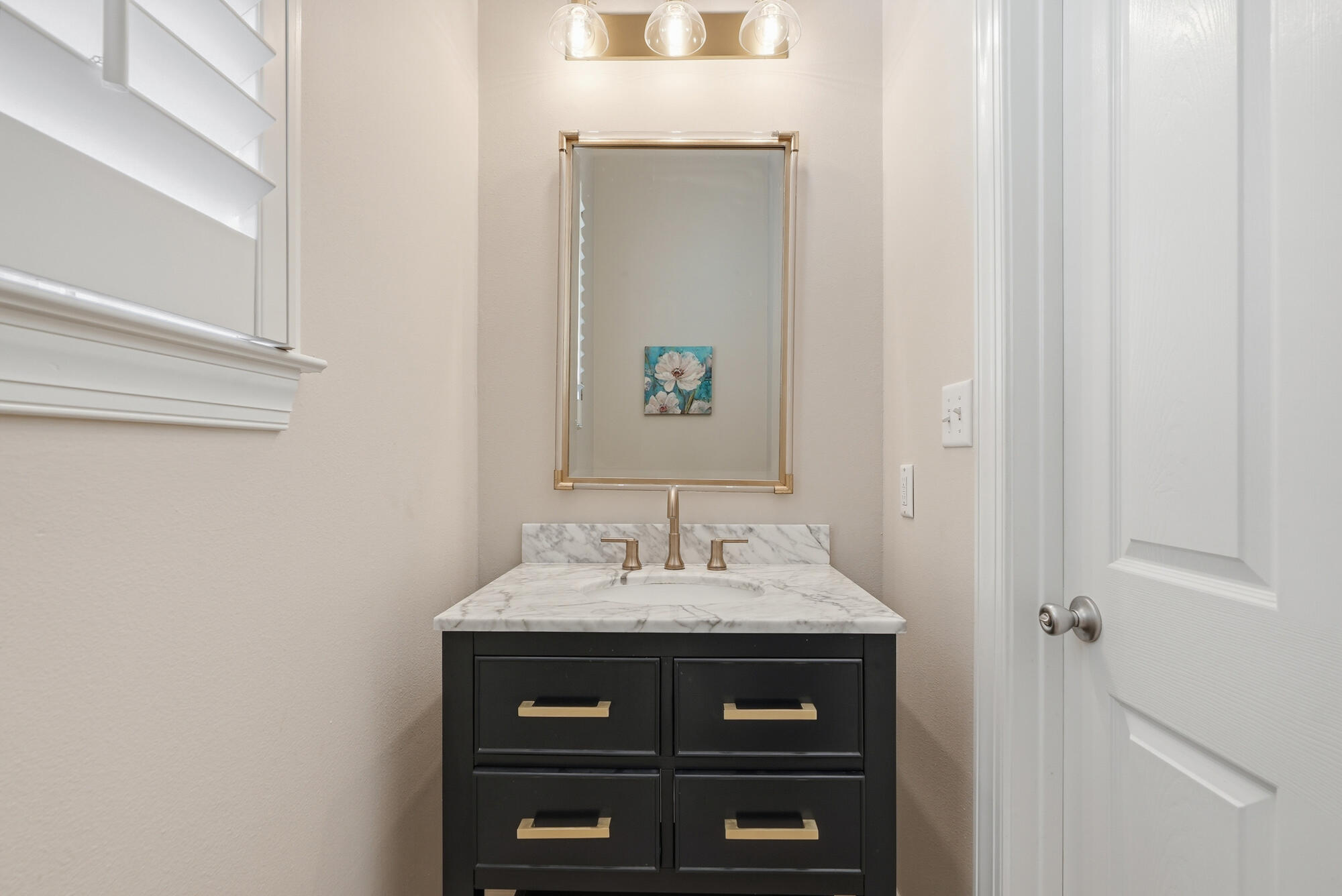 413 Sea Winds Drive Santa Rosa Beach, FL 32459 - Photo 23 of 65 a bathroom with a sink and a mirror