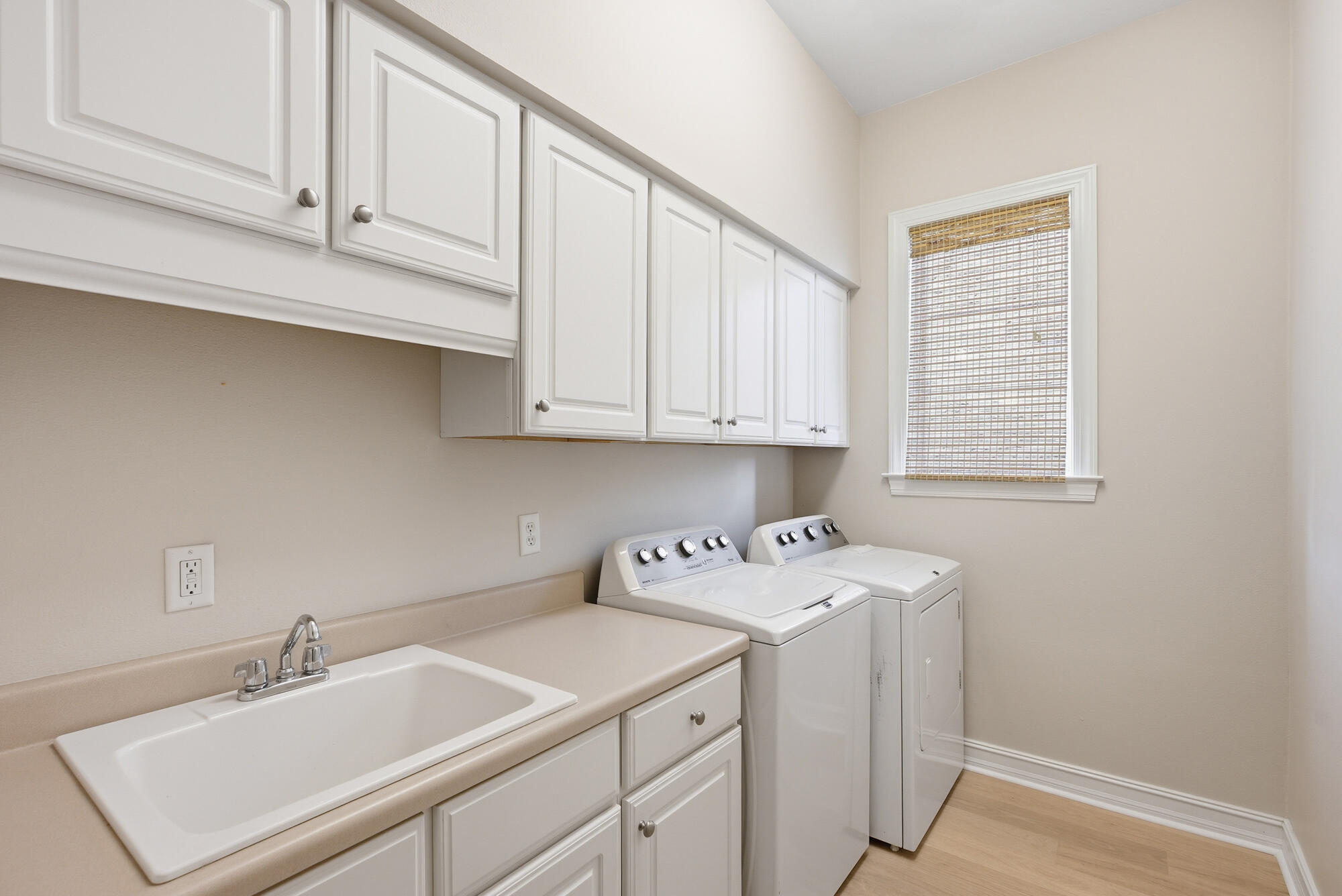 413 Sea Winds Drive Santa Rosa Beach, FL 32459 - Photo 24 of 65 a utility room with sink dryer and washer