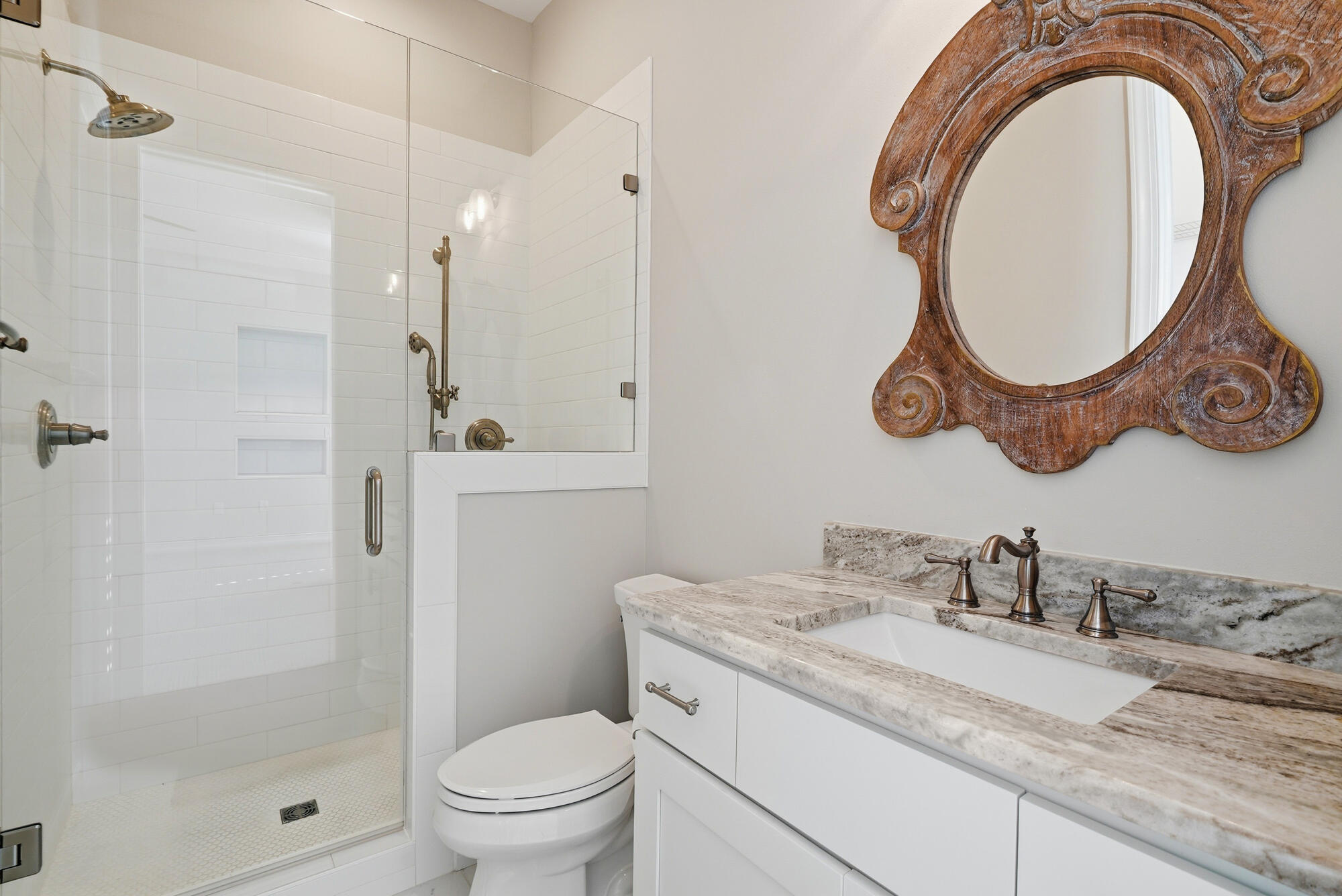 413 Sea Winds Drive Santa Rosa Beach, FL 32459 - Photo 40 of 65 a bathroom with a granite countertop toilet a sink and a mirror