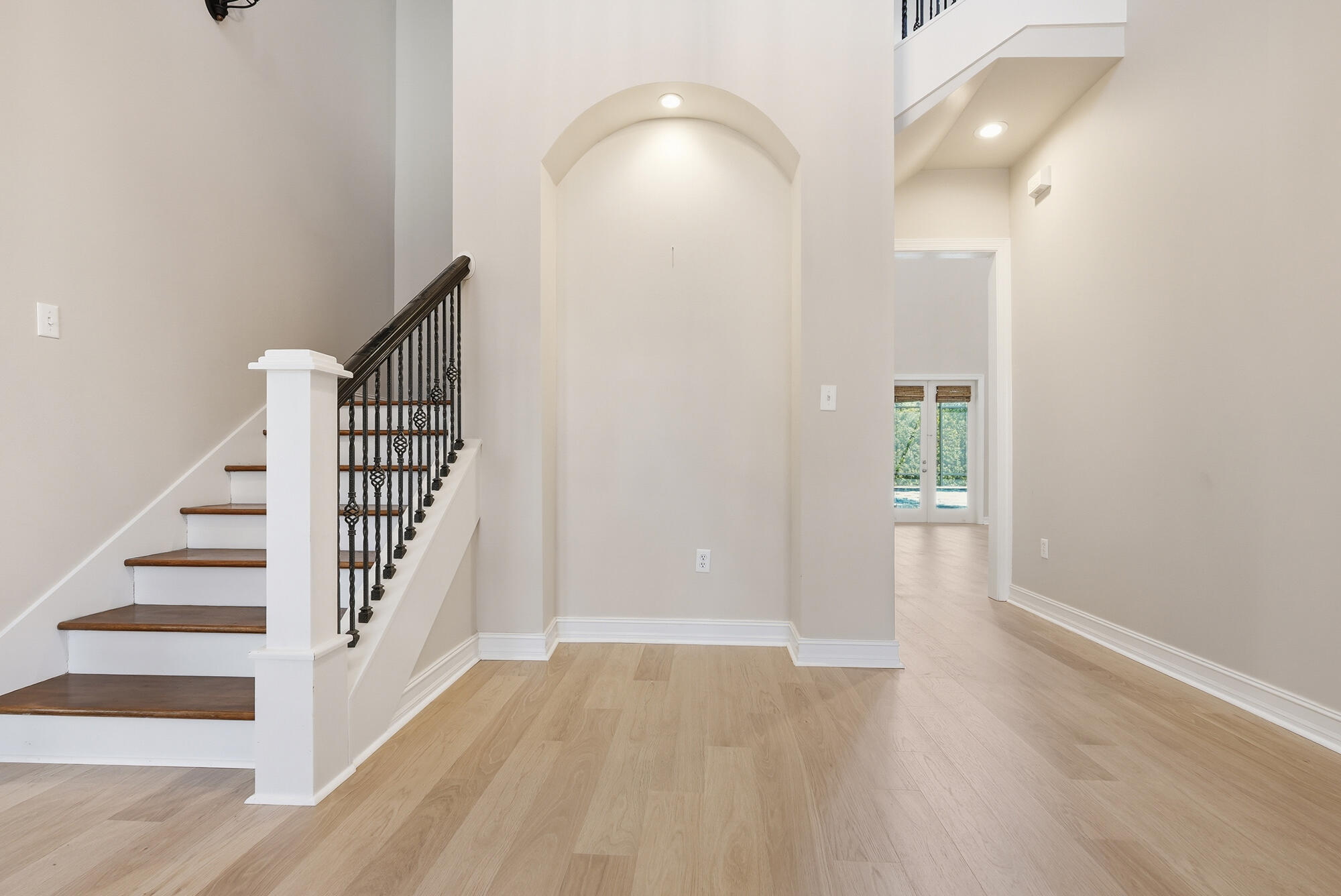 413 Sea Winds Drive Santa Rosa Beach, FL 32459 - Photo 4 of 65 a view of a hallway with staircase and white walls