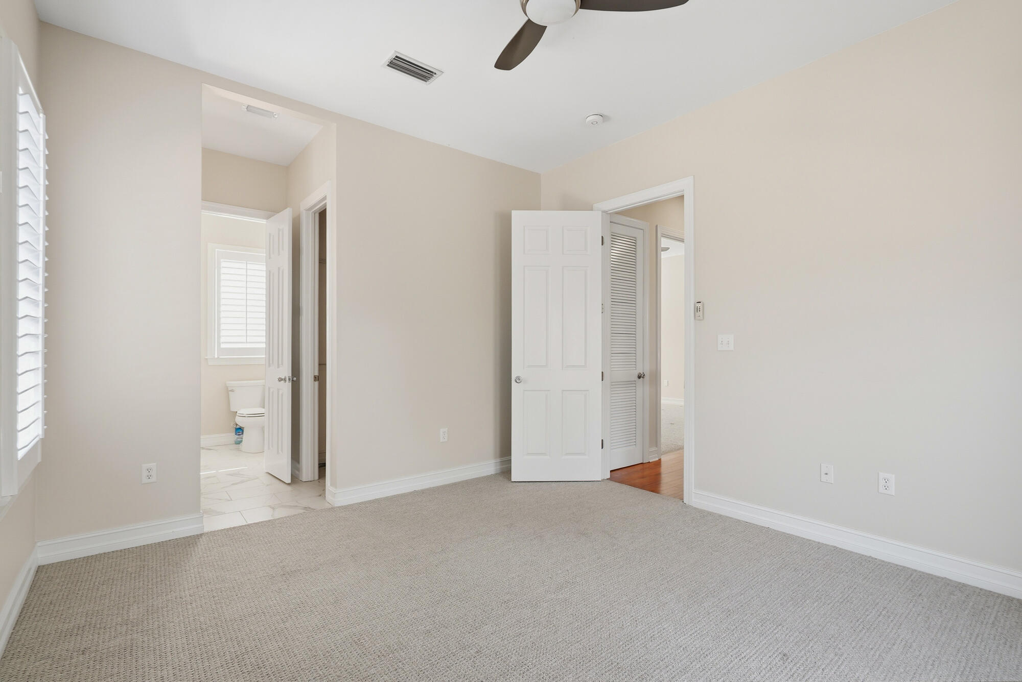 413 Sea Winds Drive Santa Rosa Beach, FL 32459 - Photo 44 of 65 an empty room with windows and closet