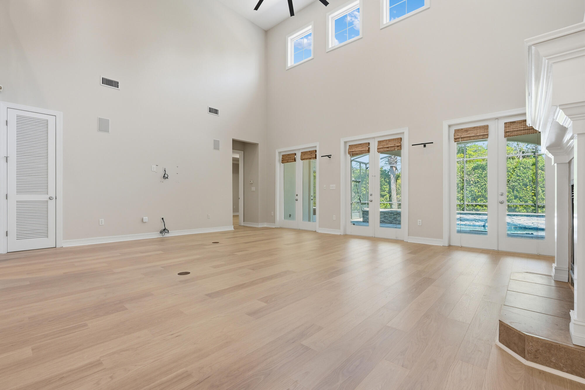 413 Sea Winds Drive Santa Rosa Beach, FL 32459 - Photo 10 of 65 a view of an empty room with wooden floor and a window