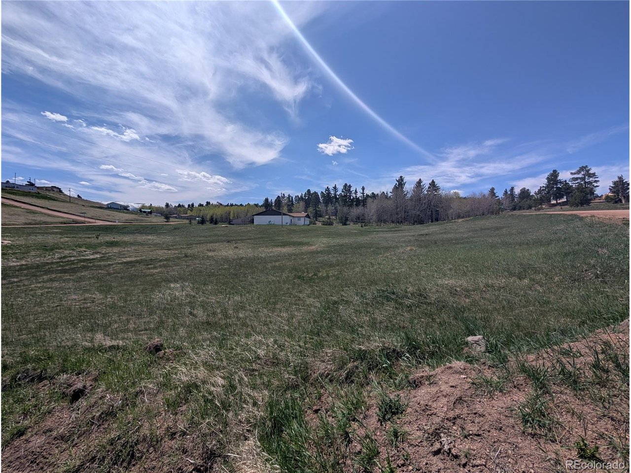 83 Fountain Dale Lane Divide, CO 80814 - Photo 7 of 11 a view of a big yard with wooden fence