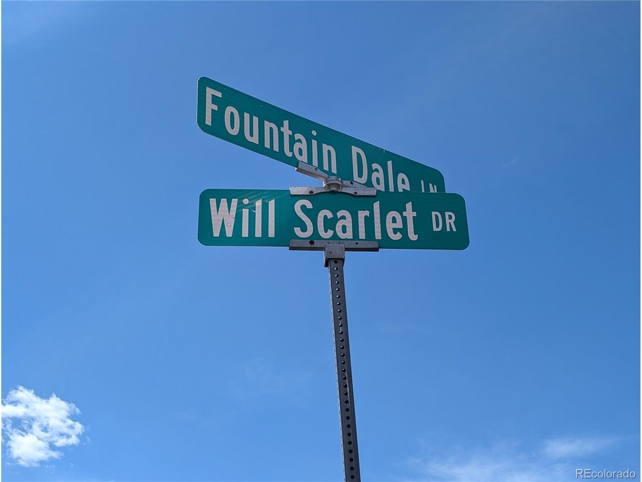 83 Fountain Dale Lane Divide, CO 80814 - Photo 10 of 11 a street sign on a pole