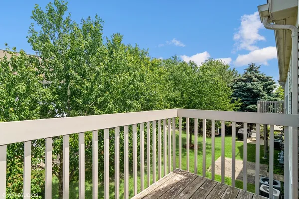 a view of a wooden roof deck